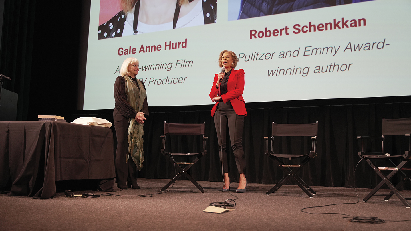 Armani (left) presents Tonya Lewis Lee (right) the Vanya Exerjian Award for Empowering Women at the 2023 Socially Relevant Film Festival.