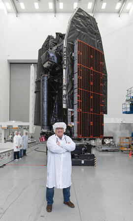 Hamalian proudly stands in front of the newly constructed Viasat-3 F1 Satellite which is scheduled to be launched in 2023.