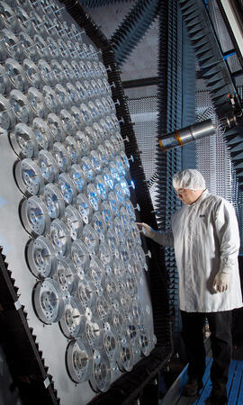 Hamalian inspects the Thuraya D3 Satellite inside an anechoic chamber at the Boeing facility